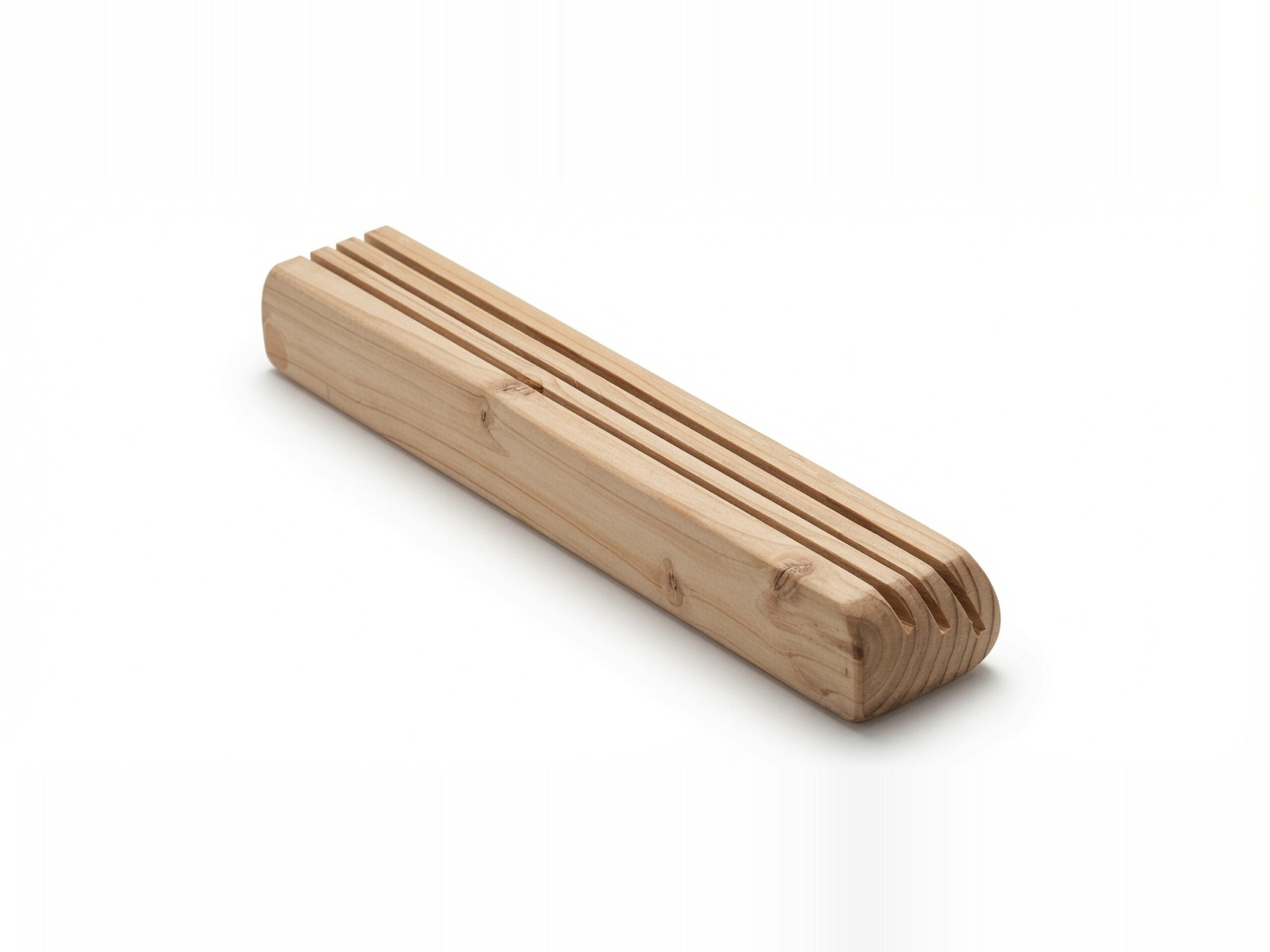 Empty wooden playing card holder made from fir, showing natural wood grain, beveled edges and three parallel card slots on a white background.